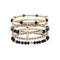 Set of 5 Gold, Black Crystal, and Gold Cross Stretch Bracelet Set
