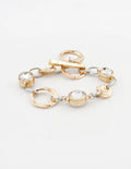 Gold & Silver Textured Open Circle Bracelet with Clear Stone