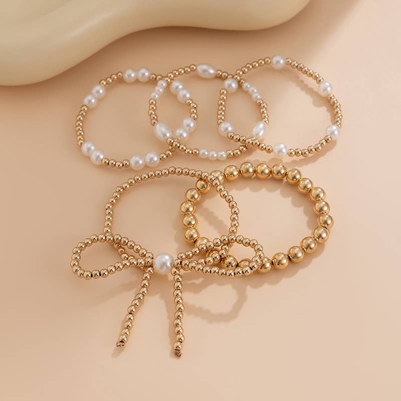 MULTI LAYER BEAD PEARL BOW BRACELET